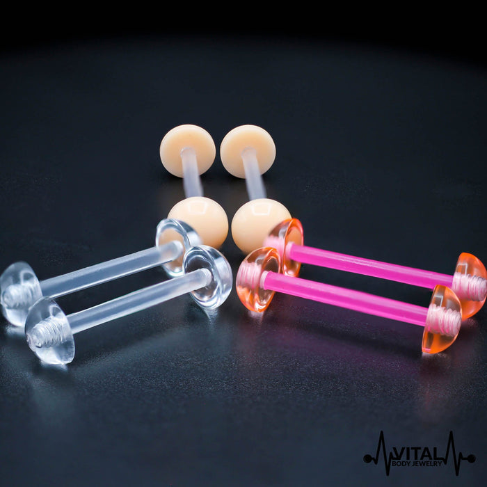 14G Bio Flex tongue barbell in pink, clear, and flesh colors with 6mm ball, flexible design for comfort and healing