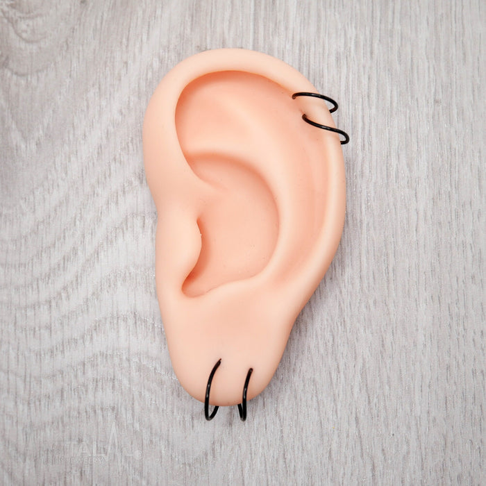 20G surgical steel double hoop earrings with open design, available in silver, gold, black, and rose gold colors.