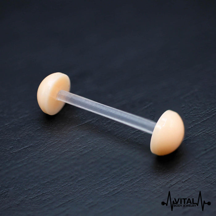 14G Bio Flex tongue barbell with ball end in pink, clear, and flesh colors, designed for comfort and flexible healing.