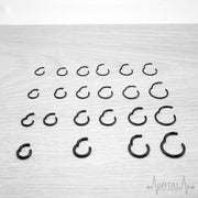 14G titanium hinged segment nose ring with black finish for a sleek, sophisticated look, perfect for everyday wear and sensitive skin.